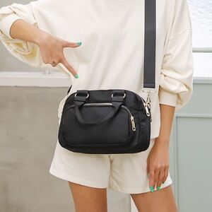 Amazon basics Nylon Women, Waterproof Multi Pocket Cross-body hand Bag